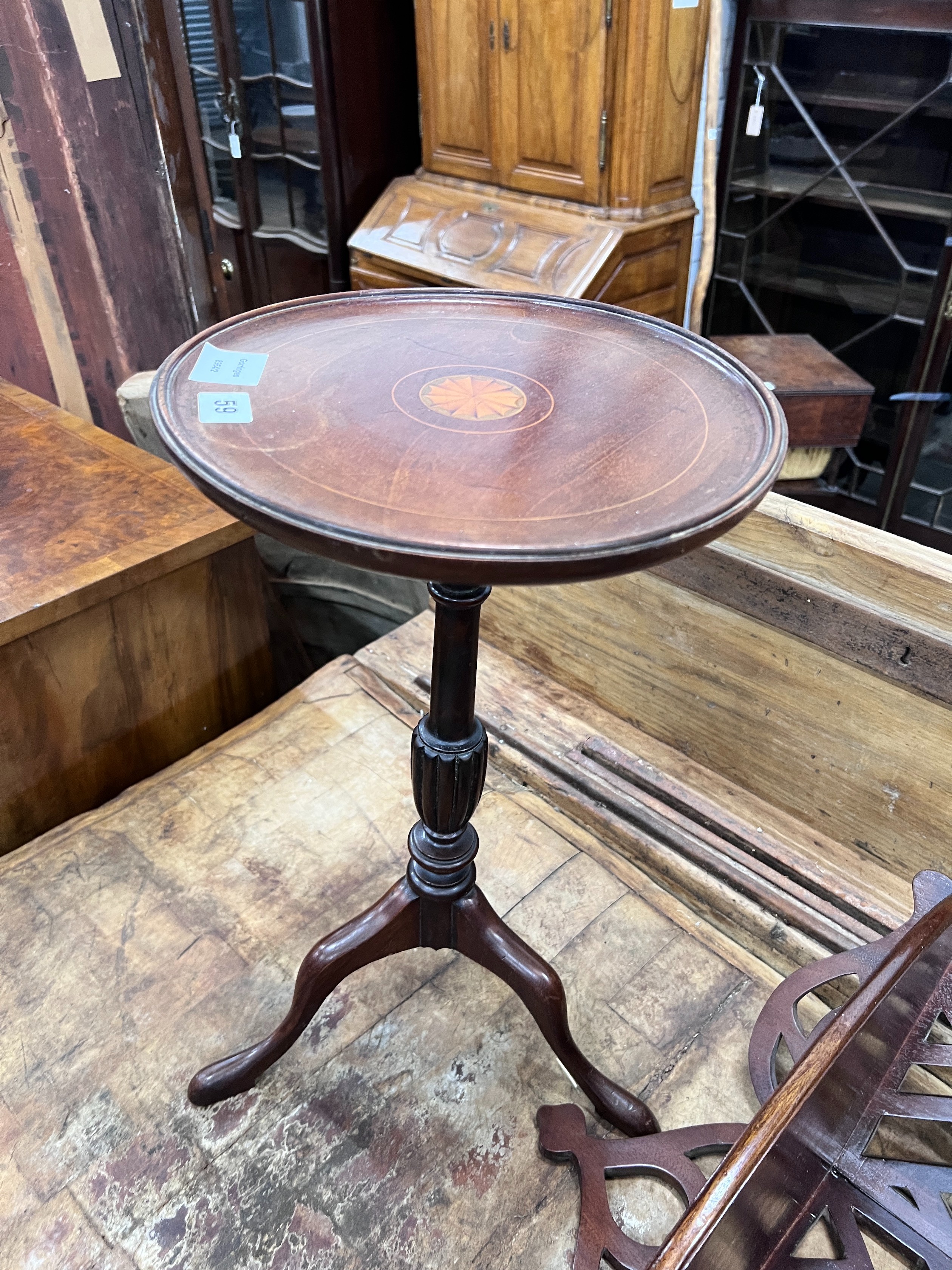 An Edwardian fret cut corner wall bracket, width 54cm, height 92cm together with an Edwardian style mahogany tripod wine table *Please note the sale commences at 9am.